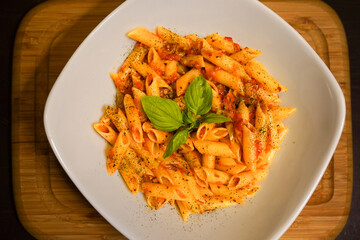 Pasta with sauce on white plate
