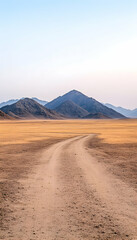 Path leading to mountain peak in desert landscape at dusk for travel posters