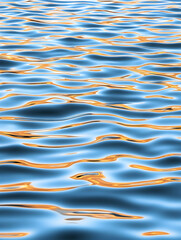 Sunlit waves of water for background, texture or abstract scenic travel shot