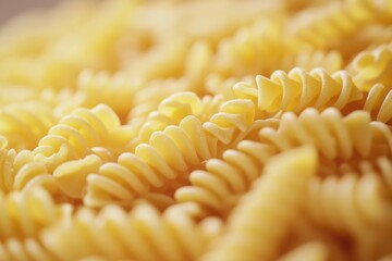 Close-up of uncooked spiral pasta.