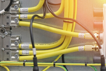 Connection of electrical modules using insulated copper electrical wires. Close-up. Soft focus.