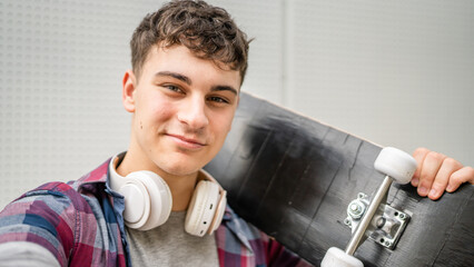 portrait of young Caucasian man teenager 18 or 19 years old outdoor