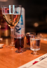 glass of white wine and tinctures