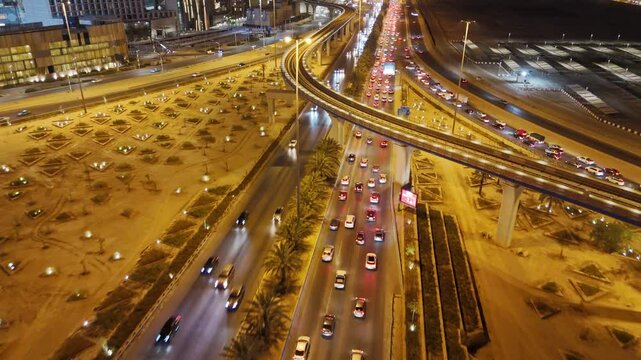 Nighttime Aerial View of Riyad City Lights and Highways. KAFD