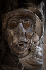 Old ornaments on a palace in Ragusa, Sicily