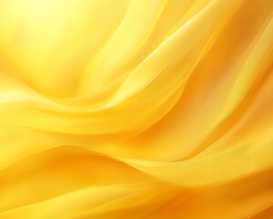 Fototapeta premium Soft yellow abstract fabric background with smooth flowing curves and a gentle blur effect creating a warm 