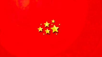 Yellow stars on red background 
