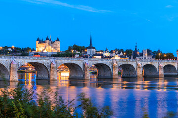 Saumur, France, located at the Loire river during dusk