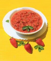 Gazpacho is a classic Spanish tomato soup flavored with mint, garlic, spices, and herbs. A must-try!