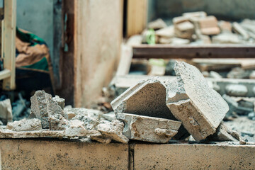 Demolished debris broken concrete and brick in abandoned construction site