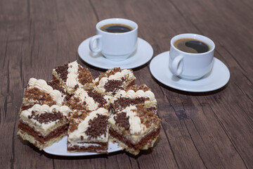 caffee and cake on wooden background