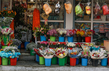 Flower shop near to a temple in the city of Kathmandu