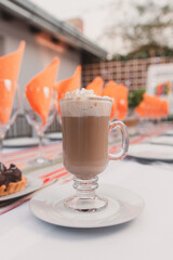 Capucchino served on a long table.