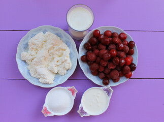 Summer Sweet Cherry Soup with Cream and Cream Cheese. A delicious light summer dessert made from cherries, cream cheese and cream with mint leaves