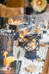 Captivating fire displays create a warm ambiance in a cozy outdoor setting