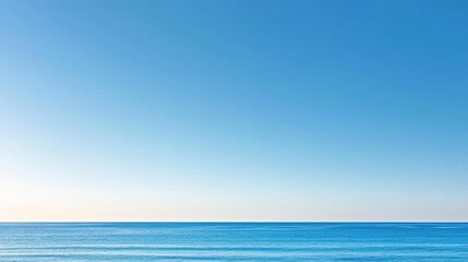 Obraz premium Tranquil Blue Ocean Under Clear Sky