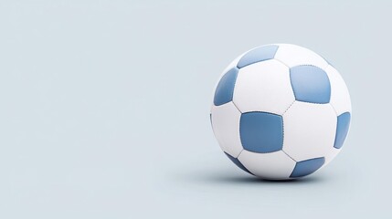 Obraz premium Blue And White Soccer Ball On Light Blue Background