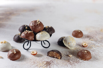 Handmade chocolate with pistachios, dark and milk chocolate pieces.