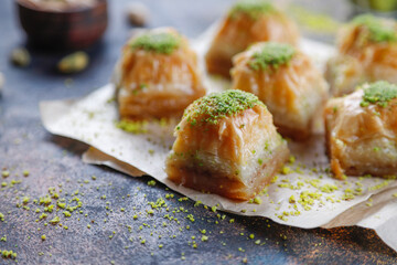 Turkish-style pistachio baklava with a glass of milk.