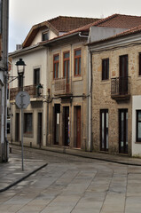 Ancient street in the city of Vila do Conde, Povoa do Varzim in Porto district in Portugal, early morning light