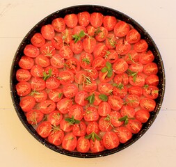 Sun-dried cherry tomatoes on a round tray