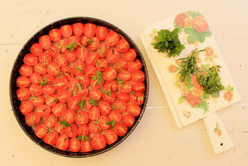 Sun-dried cherry tomatoes on a round tray