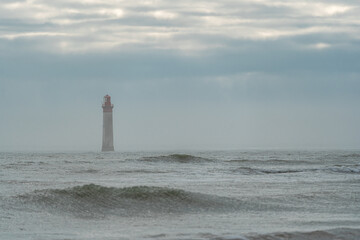 Chauveau lighthouse, isle of Re, during storm. this lighthouse is one of the famous lighthouses...