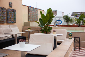Rooftop Terrace Lounge, Outdoor cafe terrace with tables and chairs in Morocco