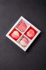 Delicious sweet mochi in the shape of red hearts
