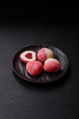 Delicious sweet mochi in the shape of red hearts