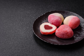 Delicious sweet mochi in the shape of red hearts