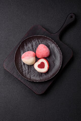 Delicious sweet mochi in the shape of red hearts