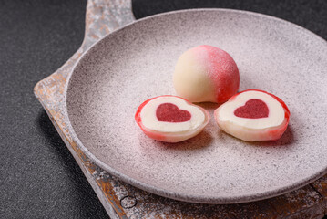 Delicious sweet mochi in the shape of red hearts
