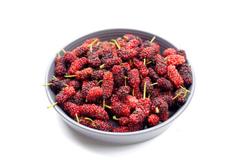 Fresh mulberry on white background.