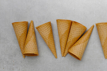 Waffle cones on grey  background