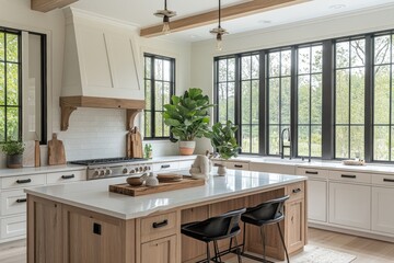Fototapeta premium Bright and airy kitchen showcases white cabinets, light-colored walls, and expansive windows that invite views of the outdoors