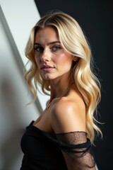 Fototapeta premium Elegant blonde hair, sharp geometric black & white backdrop , contrast, abstract, portrait