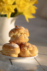 mini eclairs in the morning light daffodils