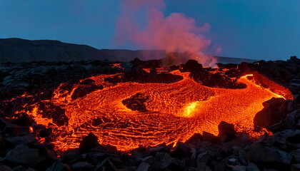 Fototapeta premium Lava glowing brightly in the dark, lighting up the surrounding rocky terrain