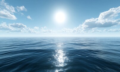 Fototapeta premium An endless expanse of calm ocean water under a clear blue sky, with the sun casting a bright reflection on the surface.