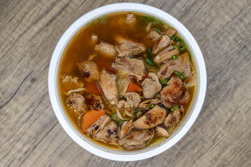 BBQ chicken noodle soup served hot and in a large bowl for a big appetite