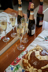 Wedding reception table with champagne glass and loaf