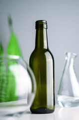 empty bottles on the gray background 