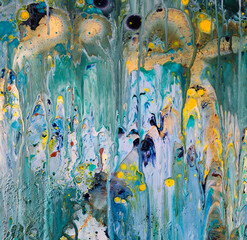 Acrylic abstract art utilizing pour painting in a creative, ethereal and surreal pattern. Vibrant turquoise, navy, gold and white colors in a vibrant swirling design, both mystical and other worldly. 