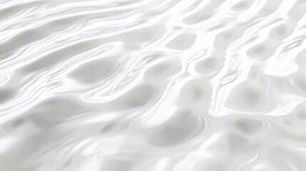 Obraz premium Close-up shot of a smooth water surface, displaying gentle ripples. The texture creates a serene and tranquil visual effect, perfect for relaxation and reflection.