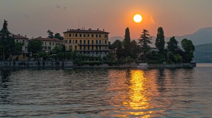 Obraz premium Lakeside sunset over Italian villas