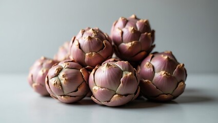 Fototapeta premium Pile of rosy artichokes - Edible beauty - Healthy eating promotion, food blog