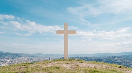 Wooden cross on hilltop, city view, serene landscape, spiritual symbol