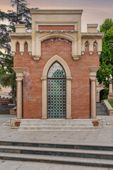 The Javad Xan Mausoleum in Ganja, Azerbaijan, is renowned for its intricate architectural details, which are complemented by lush gardens and a vibrant blue sky