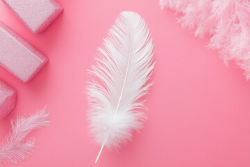 Obraz premium Elegant white feather lies on a pastel pink background